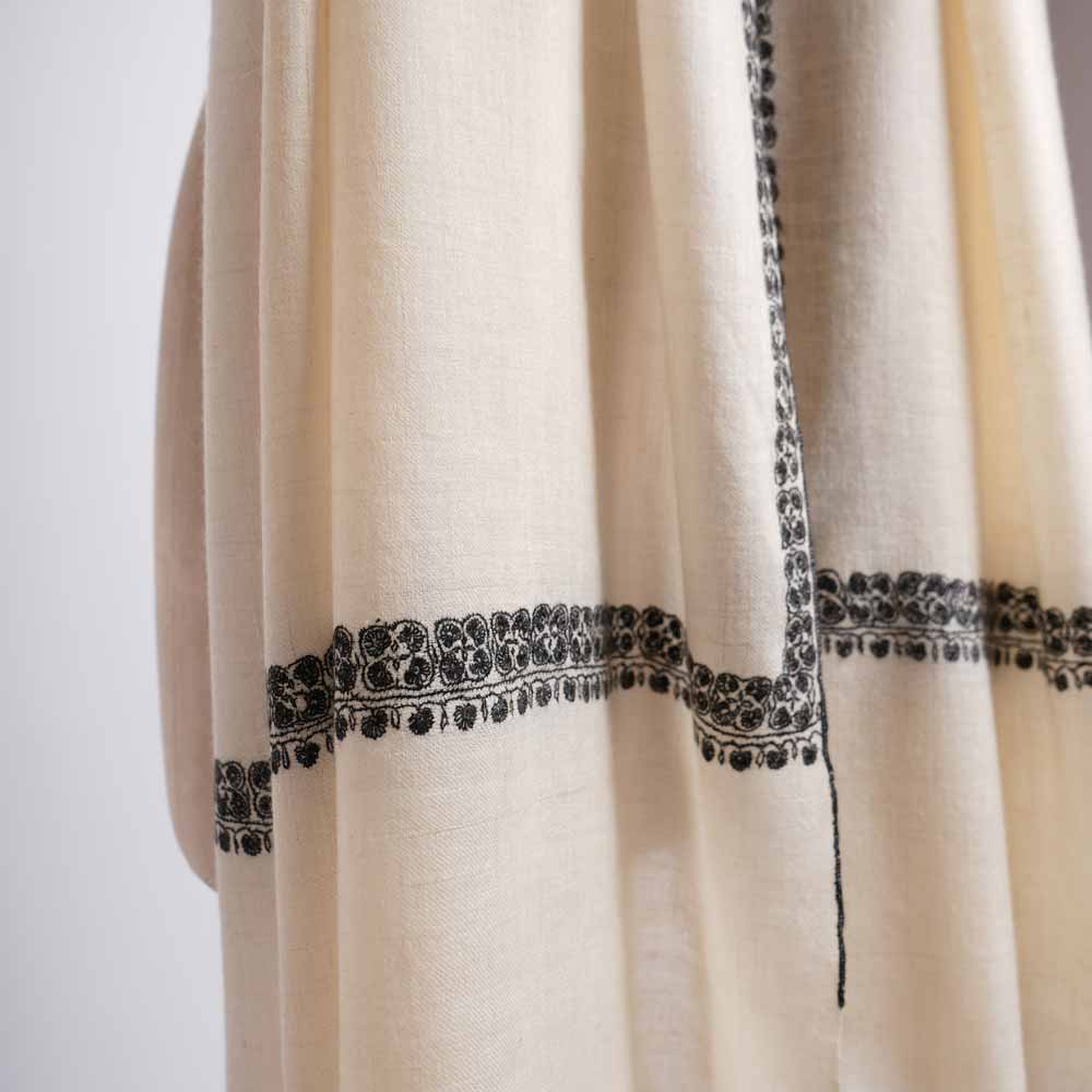 Shahkaar natural white cashmere scarves are elegant and soft cashmere shawls designed and made by artisans.