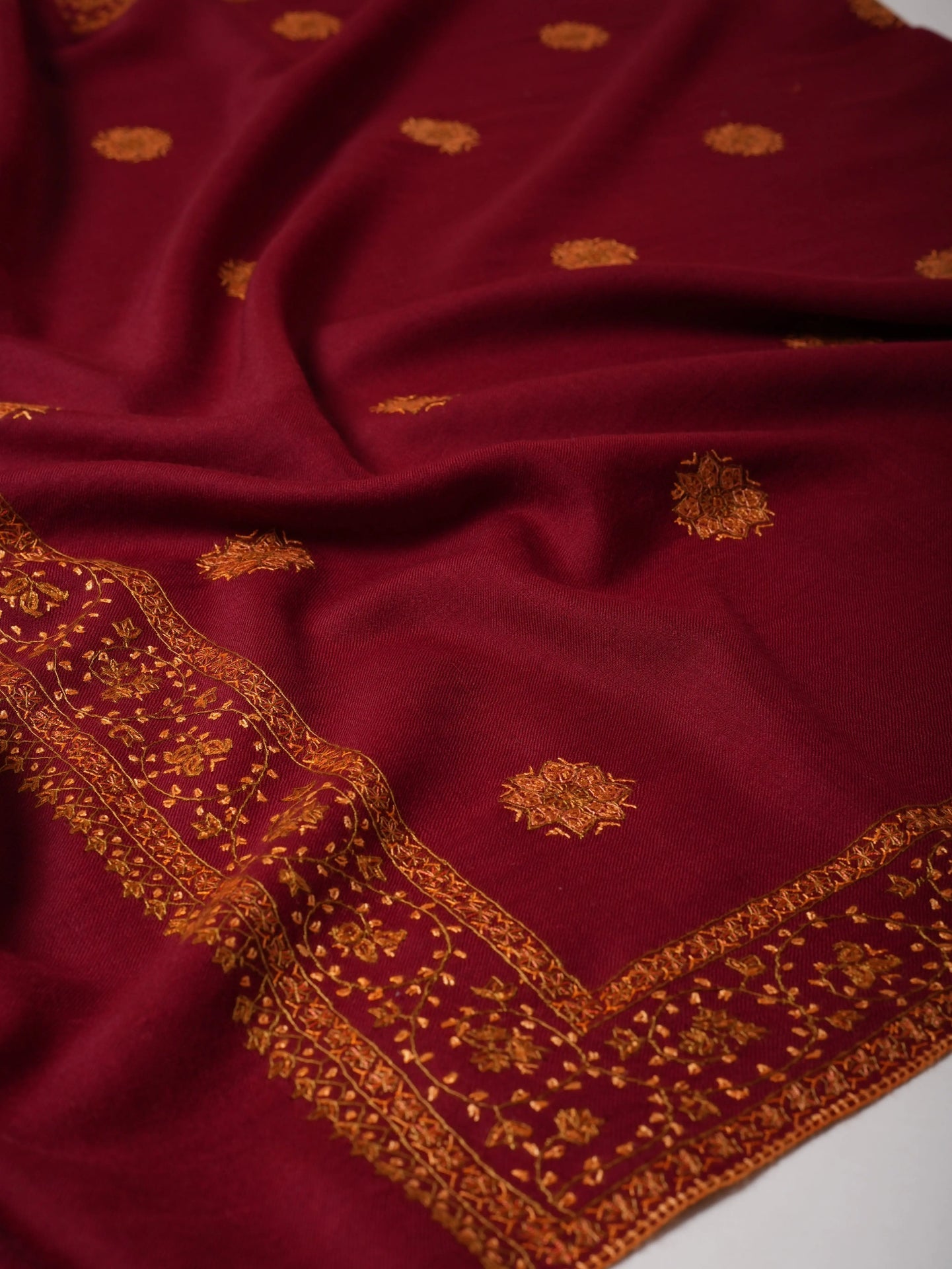 Fine Wool Maroon Shawl with Hand-Embroidered Buteh Daur Motifs Shahkaar