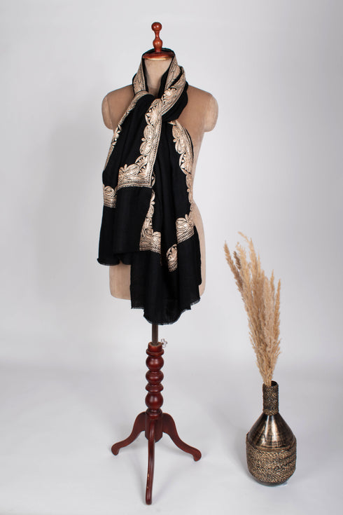 Black Pashmina Wrap adorned with Water Gold Zari Embroidery.
