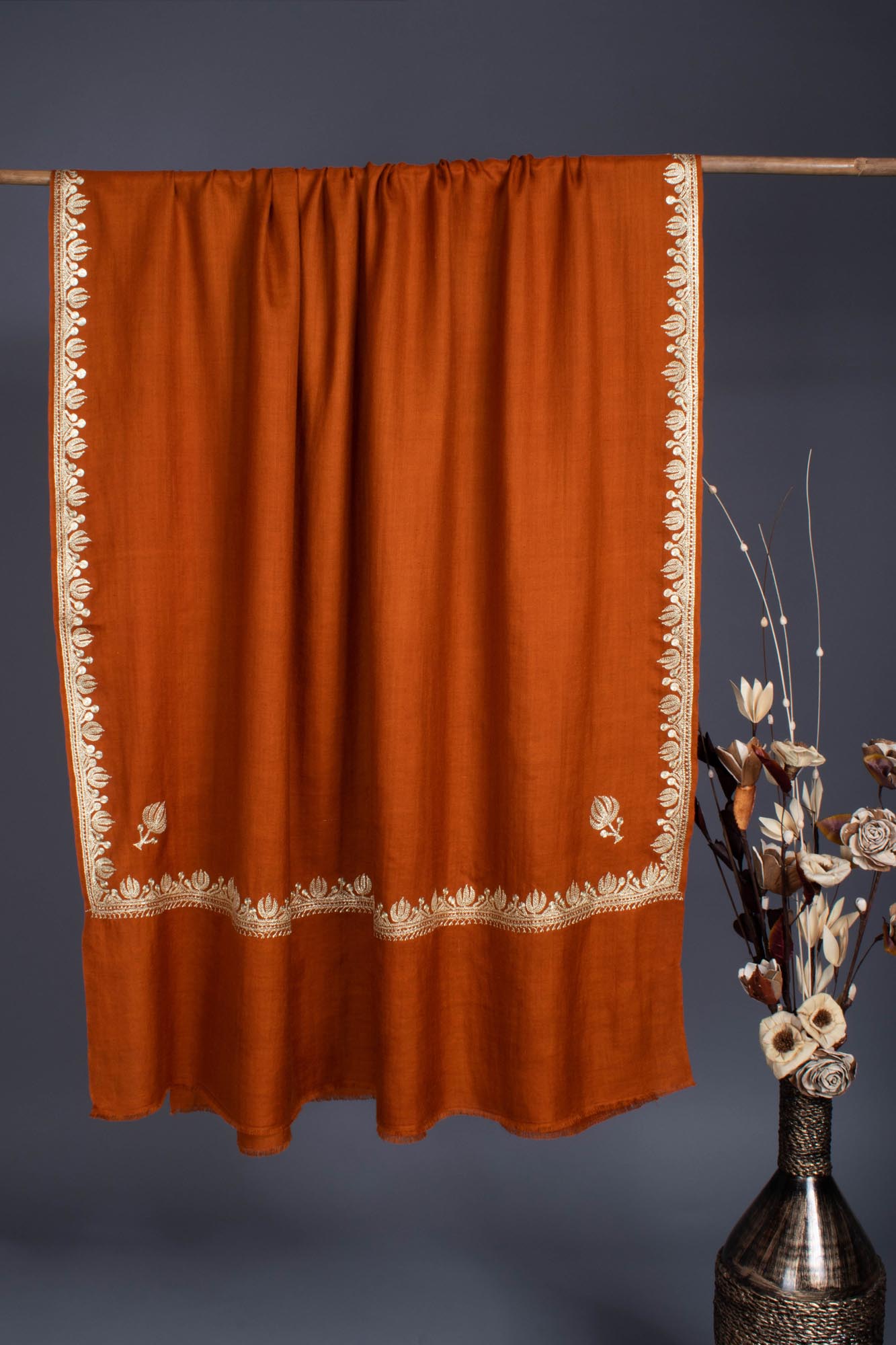 Rust Pashmina Wrap adorned with a Lotus Motif Tilla - BHANDARIA