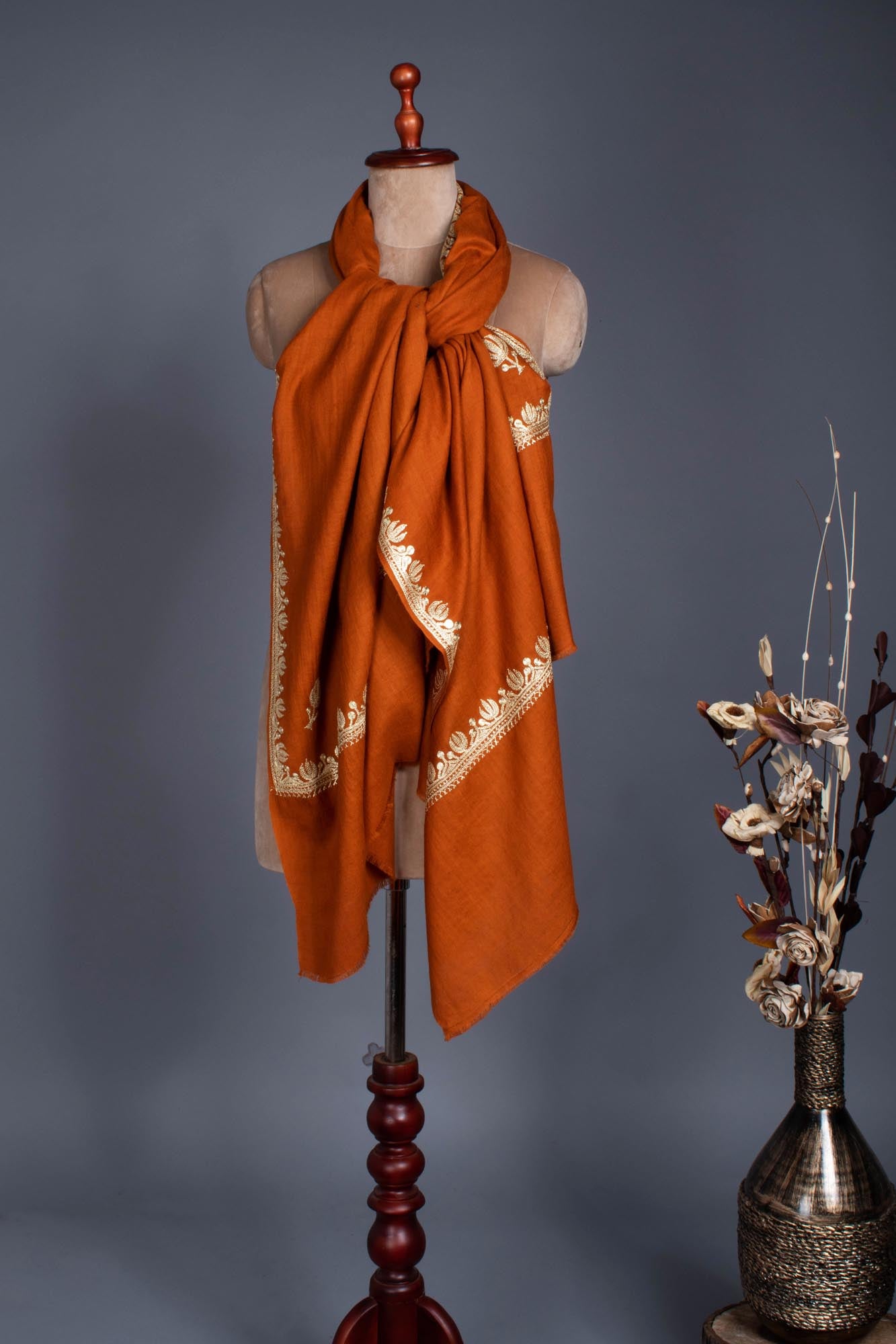 Rust Pashmina Wrap adorned with a Lotus Motif Tilla - BHANDARIA