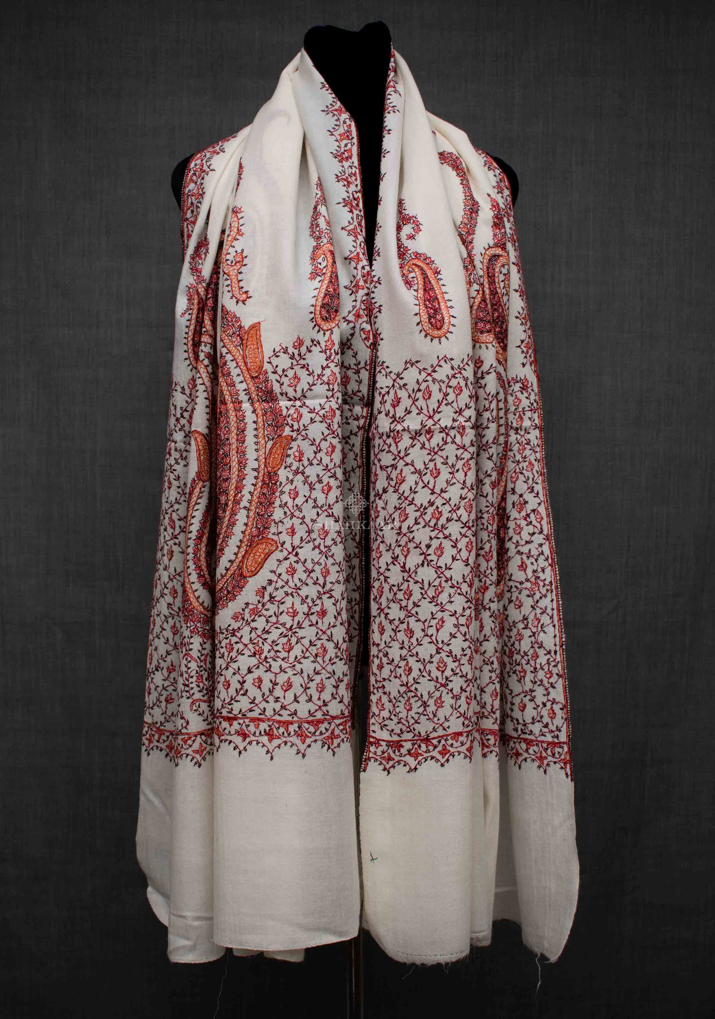 Shahkaar Embroidered White Woollen Shawl wrapped on a dummy