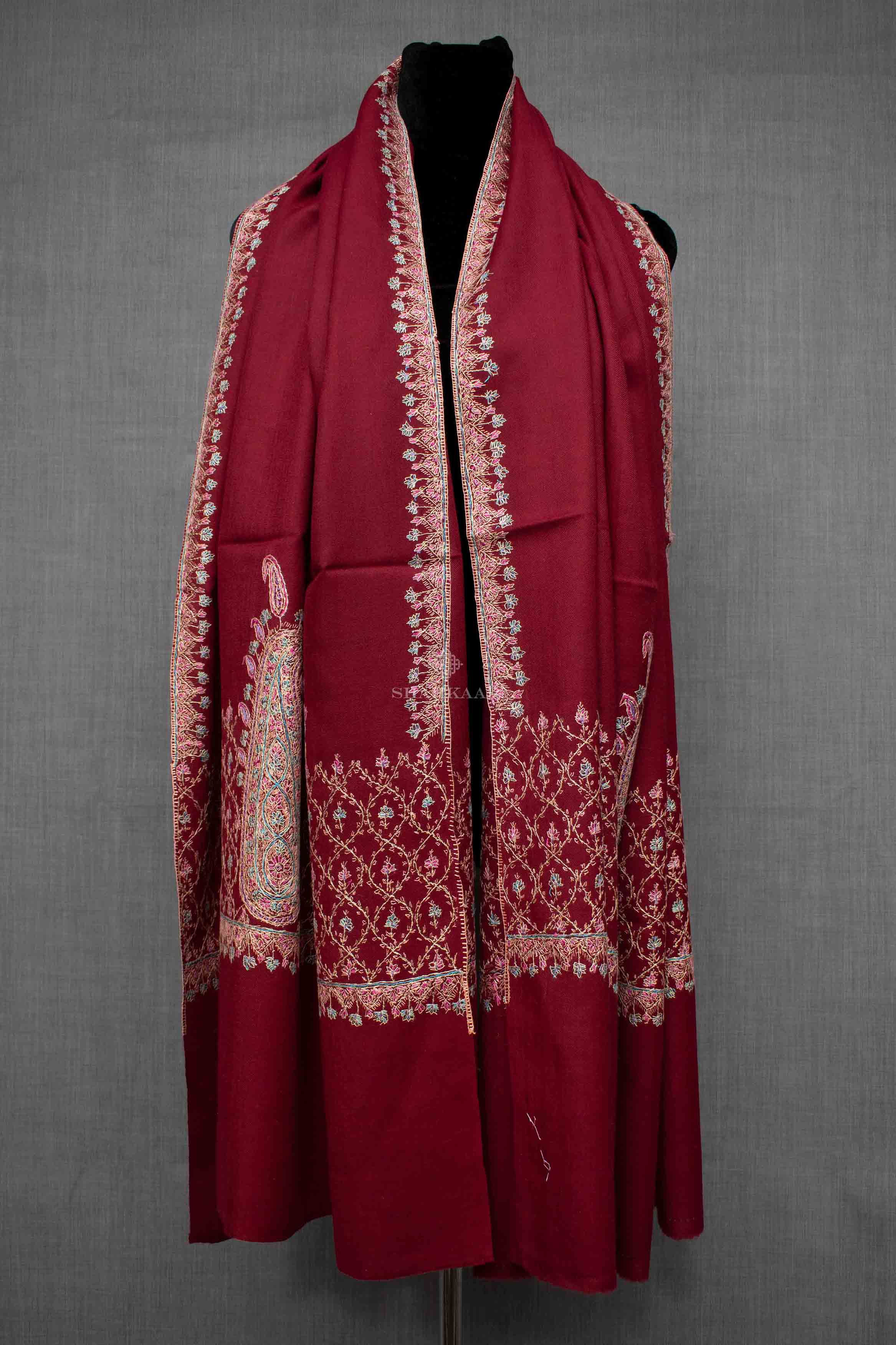 Shahkaar Embroidered Maroon Woollen Shawl wrapped on a dummy