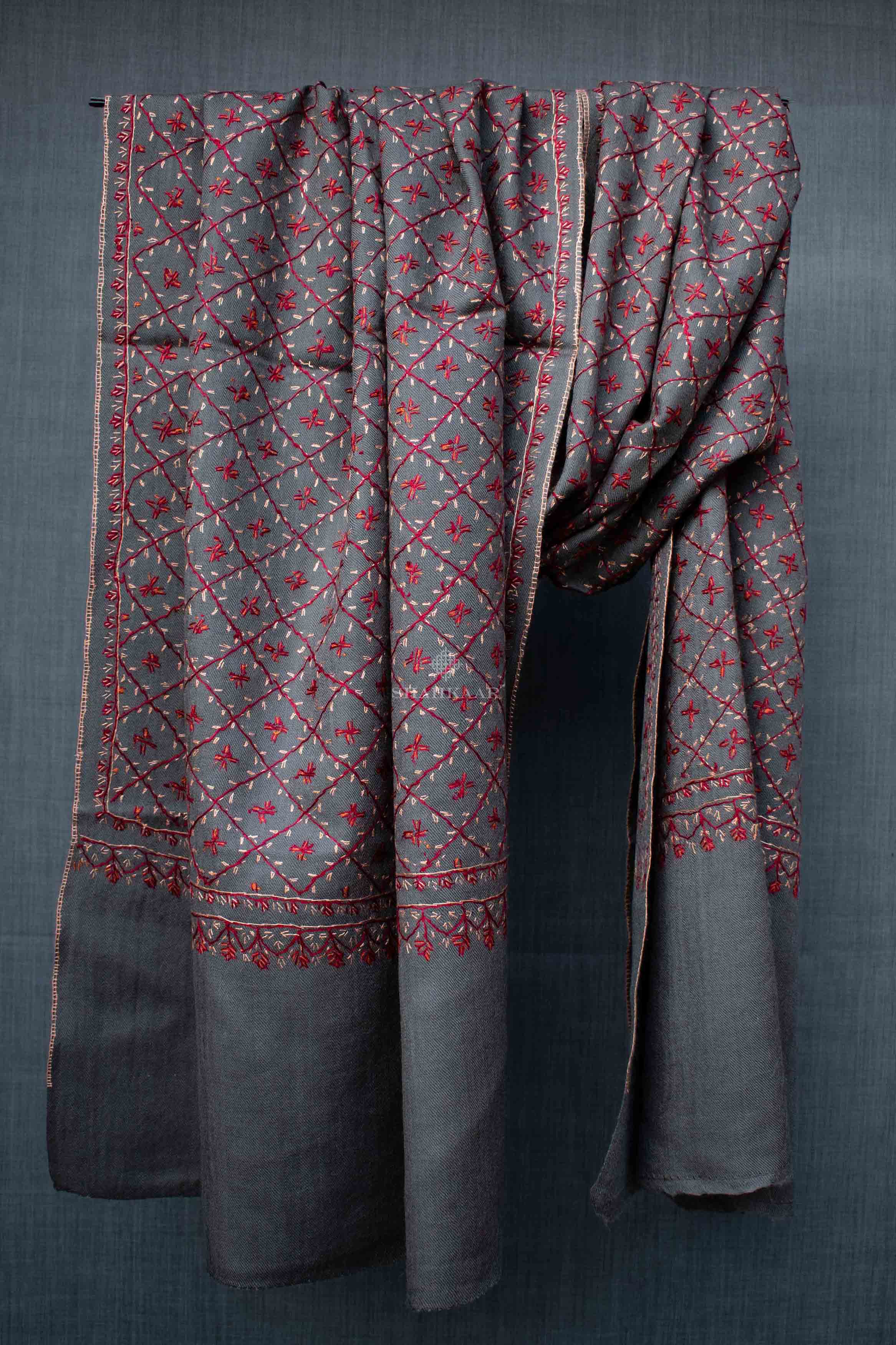 Shahkaar Embroidered Grey Woollen Shawl hanged on a rope