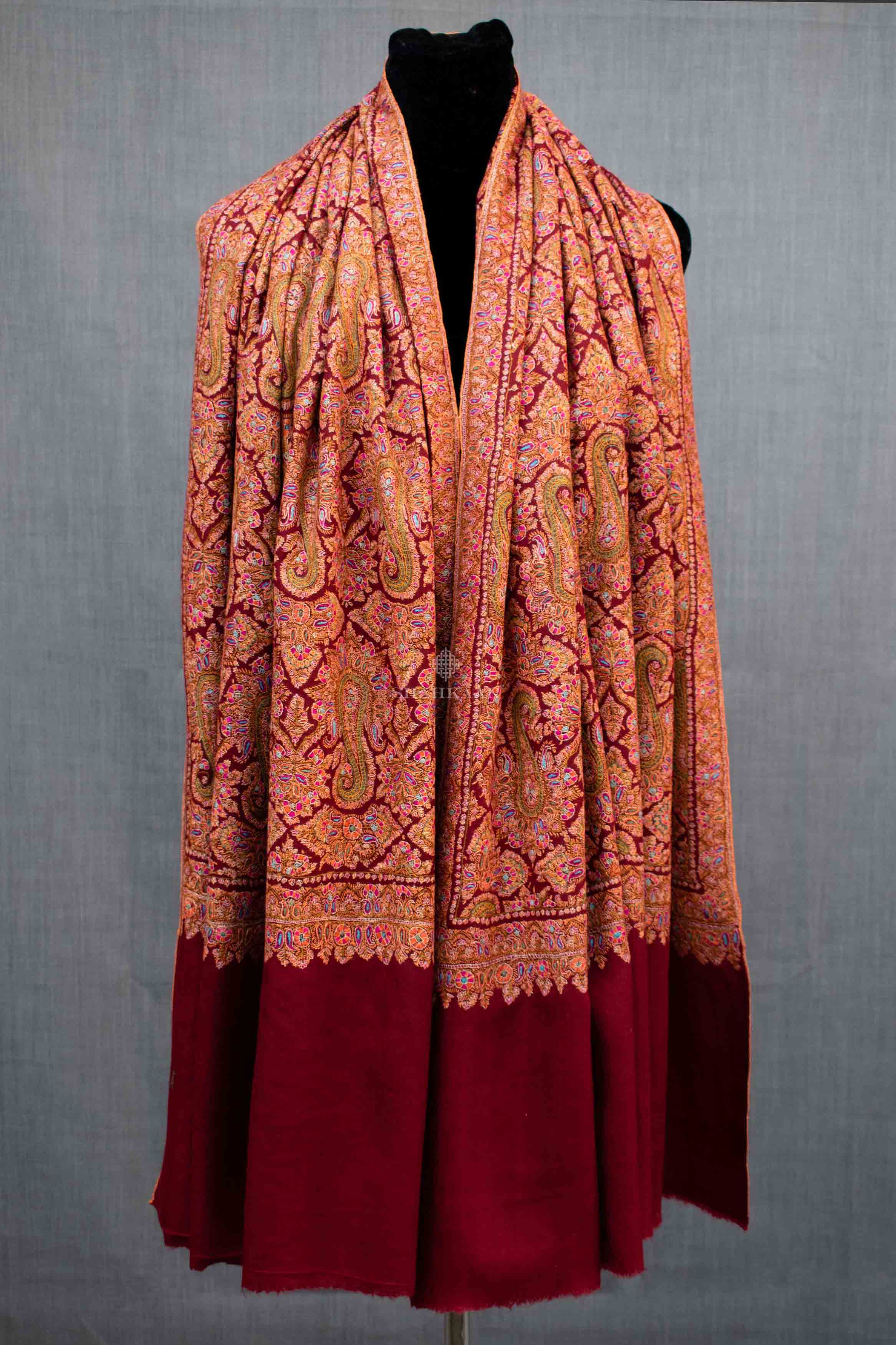 Shahkaar Embroidered Maroon Cashmere Shawl wrapped on a dummy